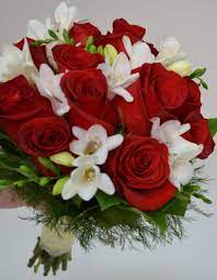 The wedding gifts play an integral role through which people shower their love and blessings on the newly married couple. A Baseball Wedding Bridal And Bridesmaid Bouquets White Wedding Flower Arrangements White Rose Bouquet Red Rose Bouquet Wedding