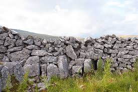 Yorkstone is a tight grained, carboniferous sedimentary rock. Example Of Viking Wall Showing Upright Stones Orthostats Near Ribblesdale Yorkshire Dales An Insight Into The Histor Dry Stone Wall Dry Stone Stone Wall