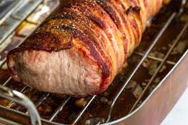I checked the roasting chart in my cookbook and. Bacon Wrapped Pork Loin Cook The Story