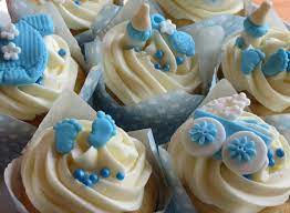 Baby rattle cupcakes are an easy and sweet ending for a baby shower! Baby Boy Shower Cupcakes Novocom Top