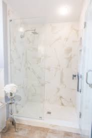 Design By Brittany Hutt Photo Flsportsguy Shower Wall Tile Blast Calacatta From Happy Fl Rustic Bathroom Designs Shower Wall Tile Bathroom Interior Design