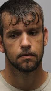 Man charged with stabbing another man with 2 children present