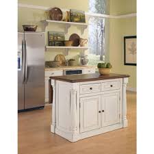 What is an island base cabinet? Home Styles Monarch White Kitchen Island With Seating 5020 948 The Home Depot Antique White Kitchen White Kitchen Island Kitchen Island With Seating