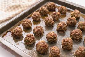 Cover a rimmed baking pan with parchment paper to prevent sticking. The Best Baked Meatball Recipe A Mind Full Mom