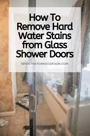 How To Remove Hard Water Stains From Glass Shower Doors The Forked Spoon In 2020 Hard Water Stain Remover Hard Water Stains Glass Shower