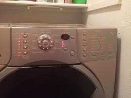 How do i get it open? Re Kenmore Elite He4t Washing Machine Model 110 45088402 I Think The Wash Load Got Off Balance When The Load Stopped