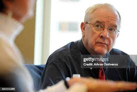 Former State Representative Steve Tool listens to fellow former... News  Photo