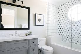 Black And White Diamond Pattern Tile Beautiful Black And White Bathroom Boasts A Shower And Tub Combo Fitted With A Black And White Diamond Bathroom Design California Beach House Window In Shower