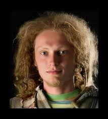 His name is Bill. He has wild hair, wears a T-shirt with holes in it,  jeans, and no shoes. This was literally his wardrobe for his entire four  years of college. He