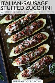 Italian Sausage Stuffed Zucchini Boats The Real Food Dietitians Recipe Real Food Recipes Paleo Recipes Dinner Delicious Healthy Recipes