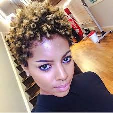 Create one of the cutest curly hairstyles for black women by creating a pony on top of your head. 21 Short Curly Hairstyles For Black Women