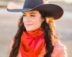 Gardénia en cuir turquoise avec franges blanches