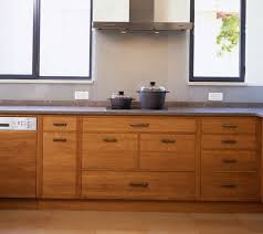 Slab Panel Honey Oak Cabinet Hardware Idea Slab Door Cabinets Slab Door Kitchen Kitchen Interior
