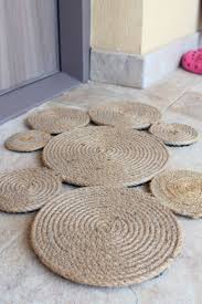 Modular carpet or carpet tiles are produced by inserting tufts into a pvc or bitumen compound woven carpet is sometimes referred to axminster or wilton. How To Sew A Gorgeous Coiled Rope Rug Easy Peasy Creative Ideas