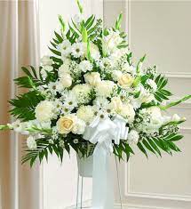 White roses express reverence, innocence and youthfulness; White Rose Funeral Bouquet Delivery To Madagascar With Artiflora