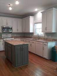 The lower cabinets are painted gauntlet gray 25° to match the island. Decorators White Gauntlet Gray Jubilee 2 Cabinet Girls