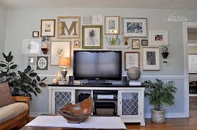 A Great Way To Decorate Around Your Flatscreen Tv Add Pictures Of Different Sizes And Other Wall Art Wall Decor Living Room Living Room Decor Fall Living Room