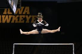 The uneven bars apparatus originally were just a set of men's parallel bars, with the bars set to different heights. Iowa Gymnastics Chow Embraces Standing Out The Daily Iowan