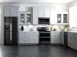 Cabinets can be refinished to a medium coffee brown. Samsung S Outlook Is Black For Kitchen Appliances