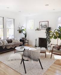 One of the first thing that might help you get on track when decorating a living room is deciding on a specific interior style. 5 Ways To Mix Woods In Your Home Framebridge