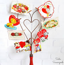 Find some pastel heart ones and red alphabet stickers to recreate the funnest balloons you've ever seen. Vintage Valentine Decorations With A Carpet Beater And Little Valentines