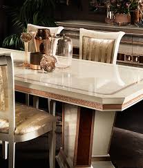 For a dining room, the focal point is usually the chandelier or the dining set. Dining Room Arredoclassic
