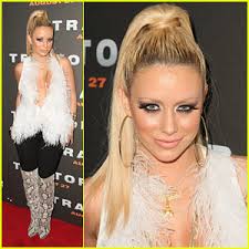 Danity Kane&#39;s Aubrey O&#39;Day rocks out the Elizabeth &amp; James Plume Feather Vest at the premiere of Traitor at New York City&#39;s Regal Union Square Stadium on ... - aubrey-oday-traitor
