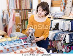 Every man i've ever been close to either starts out like. Woman Choosing Textiles In Shop Pensive Woman Choosing Textiles For Dressmaking In Fabric Shop Canstock