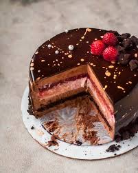 Make sure the frosting on your cake is smooth and refrigerated for about 2 hours before applying the mirror glaze. Chocolate And Raspberry Mousse Cake With Dark Chocolate Mirror Glaze Cook Til Delicious