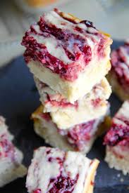 This moist & easy carrot cake is the perfect springtime treat! Skinny Raspberry And White Chocolate Gooey Cake Bars Skinny Dessert No Calorie Foods Low Cal Dessert