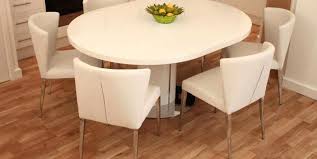 The Curva White Gloss Extending Dining Set Seats 4 To 6 People Meaning It Is Perfect For A Round Dining Room White Round Kitchen Table Extendable Dining Table
