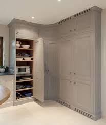 Standard cabinet doors swing, but there are also turn up corner drawers, doors, and pocket doors, can make cabinets more useful. Tall Painted Curved Open Larder Bespoke Interiors Kitchen Corner Cupboard Corner Pantry Cabinet Kitchen Corner