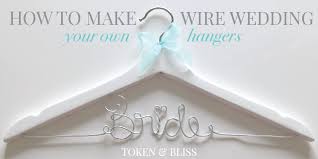 Straighten one side of the hanger; How To Make Your Own Personalized Wire Wedding Hangers Token Bliss