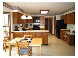 Color for granite countertop on honey oak cabinets. Color For Granite Countertop On Honey Oak Cabinets