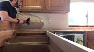 The product is lightweight, easy to handle, cut and maintain and smart tiles will remain on your walls for as long as you wish them to be. How To Remove Laminate Backsplash Youtube