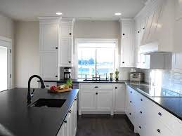 Black wave granite for the island and desert silver silestone quartz for the kitchen perimeter. Black Counter Owners Kitchens Forum Gardenweb Greige Walls Greige Kitchen Walls Kitchen Inspirations