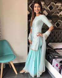 Beat the summer heat in sleeveless women's sharara designer dresses in pastel colours. Sky Blue Sharara Style Suit Paired With Luminous Gold Juttis Perfect For Day Weddings Indian Fashion Dresses Kurti Designs Party Wear Designer Dresses Indian