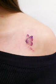 Beautiful And Meaningful Butterfly Tattoo Guide Butterfly Tattoo On Shoulder Butterfly Tattoos For Women Purple Butterfly Tattoo