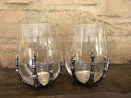 With this cool and useful thing. Pottery Barn Halloween Skeleton Hand Stemless Wine Glass Set 2 139 95 Picclick
