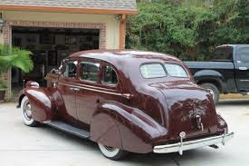 Image result for Mansion Maroon 1938 Oldsmobile