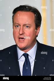 Where he was met by prime minister david cameron hi-res stock photography  and images