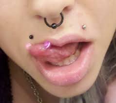 I personally think that this is the most attractive tongue piercing. Snake Eye Piercing Pictures And Information Guide