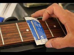 How To Clean Your Guitar Frets And Fretboard Using A Credit Card - Youtube