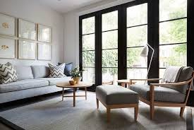 Black And White Mid Century Modern Rug Modern Gray Living Room With A Mid Century Modern Flair Features A Mid Century Modern Concrete Leather Chair Modern Grey Living Room Home Decor Tan Living Room