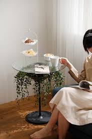 beautiful oasis glass table features a