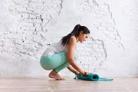 Check spelling or type a new query. Bare Feet And Hands Of Young Unidentified Woman With Bracelets Laying Out Rug For Practicing Yoga In The Gym Stock Photo Picture And Royalty Free Image Image 98770917