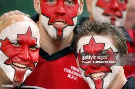 Dave Biddle of Canada is tackled by Netani Talei of Fiji during the... News  Photo