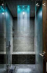 Glass shower enclosure and rainfall shower head, modern bathroom design with glass wall adjacent to bedroom. Pin By Jose Garcia On Home Decor Bathroom Shower Design Luxury Bathroom Master Baths Bathroom Interior Design