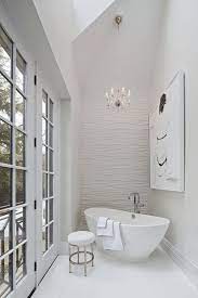 White bathroom design with textured tile. Master Bathroom Remodel Bathroom Design Luxury Bathroom Trends Bathrooms Remodel