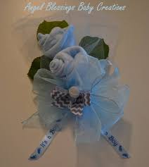Step by step video shows how to make a baby sock rose bud from baby socks. Baby Boy Shower Corsage Baby Socks Corsage Mother To Be Pin Etsy